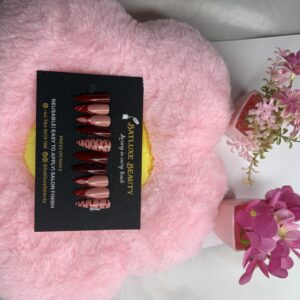 Luxury burgundy and nude pattered press on nails from Batluxe Beauty