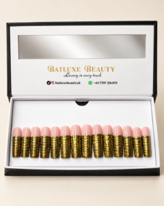 Batluxe Golden Muse Press-On Nails with nude pink and textured gold design